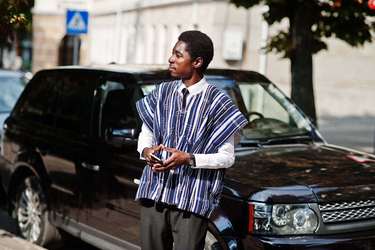 African man in traditional clothes by ASphotostudio