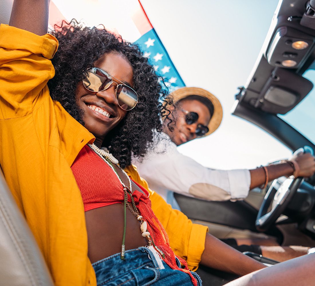 Joyful Road Trip in a Convertible Car by LightFieldStudios